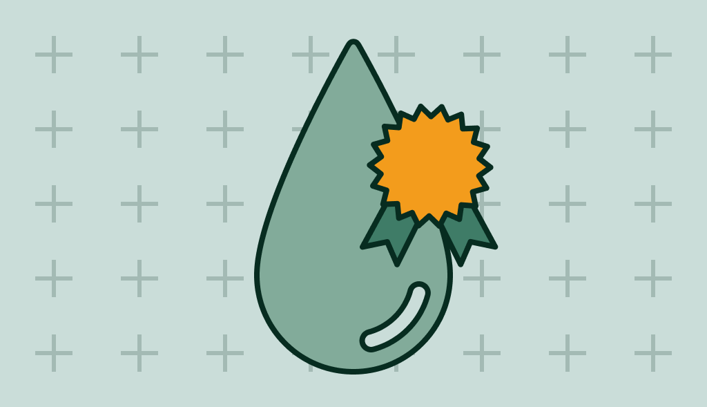 Water droplet with an orange award ribbon, symbolizing high-quality or certified water.