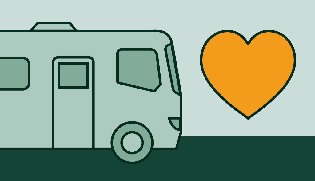 RV beside an orange heart, symbolizing how an anode rod helps extend your RV water heater’s lifespan.