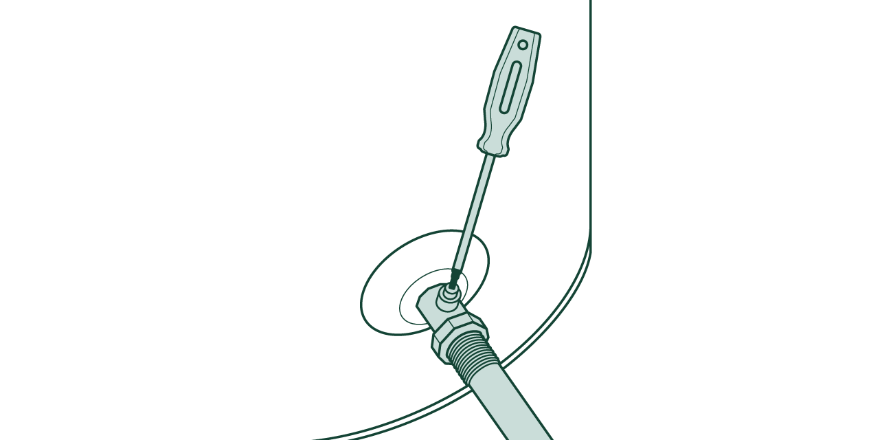 A screwdriver tightening or loosening a hex head fitting on a water heater.