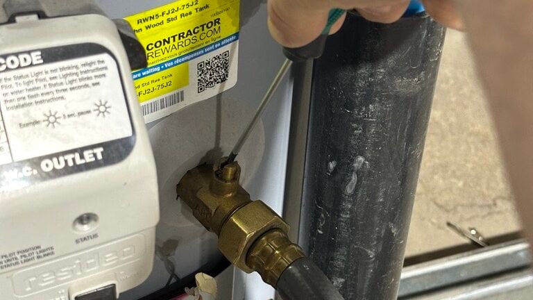 Open the water heater drain valve.