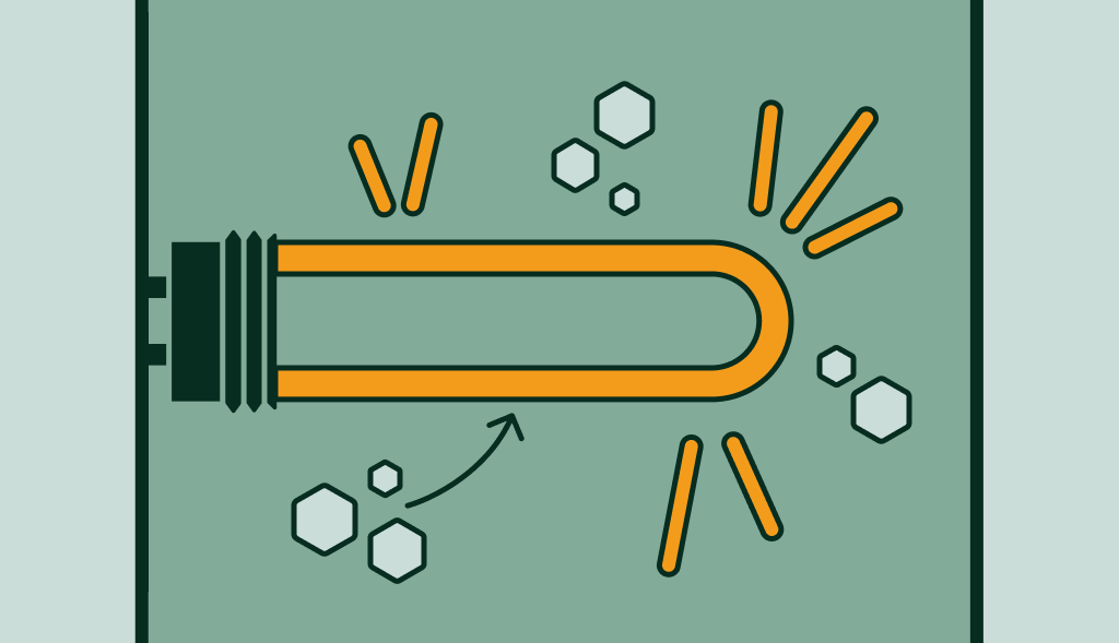 Limescale buildup on a water heater element, illustrating how mineral deposits reduce heating efficiency.